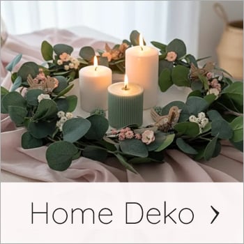 Eukalyptus Kranz mit Kerzen auf einem rosa weich fallenden Tischläufer