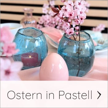 Osterei in Rosa mit Teelichtgläsern in Eieroptik