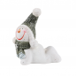 Kleiner Keramik Schneemann auf dem Bauch liegend, 90 mm.