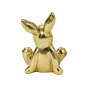 Rückansicht von der Dekofigur Osterhase sitzend, Pfötchen hinten, in Antik-Gold, 10 cm.