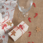Dekobeispiel  mit den 50 Papier Streuteile Weihnachten, Zuckerstange, Lebkuchenmann, in Rot/Braun.