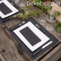 Dekobeispiel mit einem Airlaid Tischläufer als Tischset in Schwarz.
