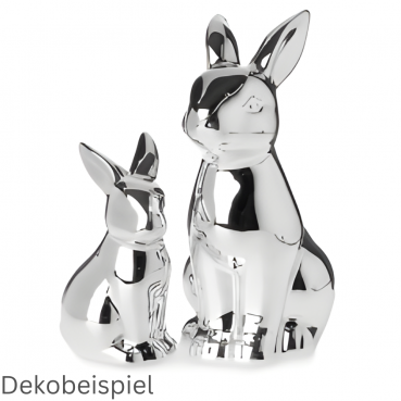 Zwei Porzellan Osterhasen in Silber.