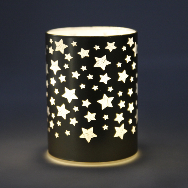 Deko LED-Licht Zylinder, Sternenzauber in Gold, 12,5 cm im Dunkeln, Beleuchtung an.