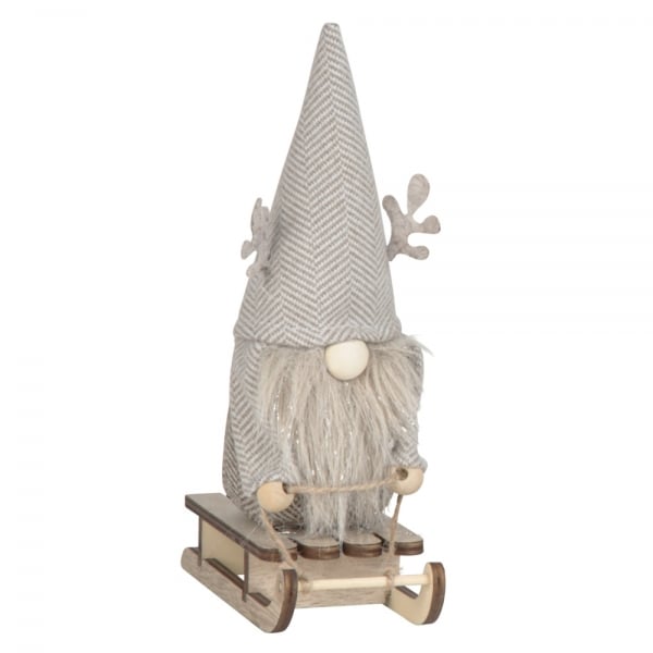 Dekofigur Weihnachten, Winter, Filz Wichtel auf Holz Ski, Mütze in Taupe, 18 cm.