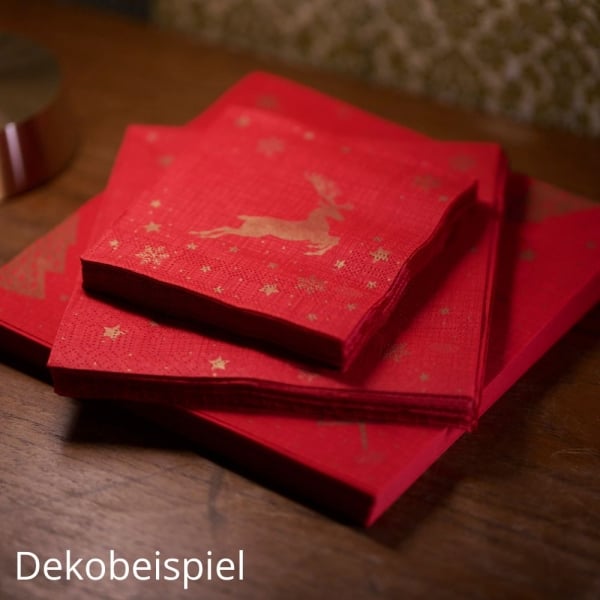 Dekobeispiel mit gestapelten roten Servietten Shimmer Trees auf einem festlich dekorierten Tisch.