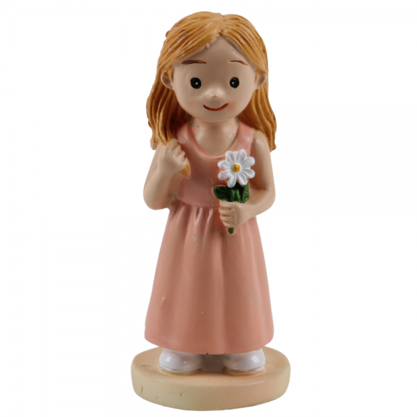 Liebevolle Dekofigur, lächelndes Mädchen im pfirsichrosa Kleid mit einer weißen Margeriten-Blüte.