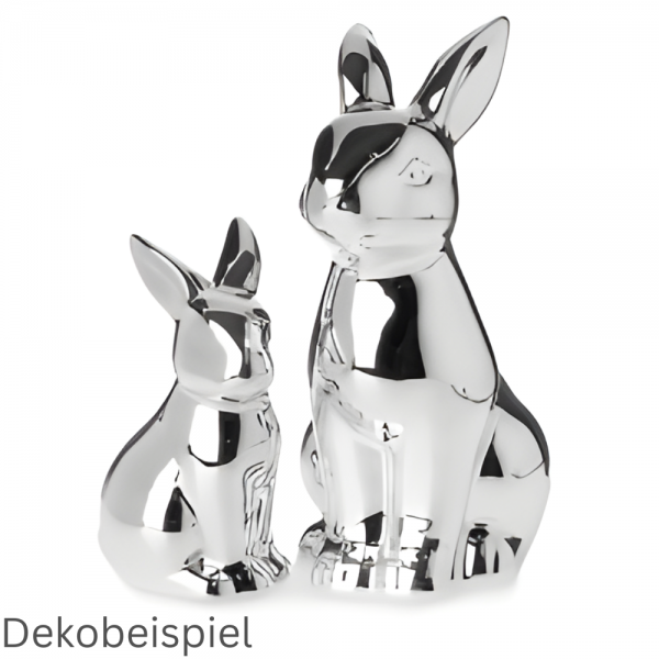 Zwei Porzellan Osterhasen in Silber.
