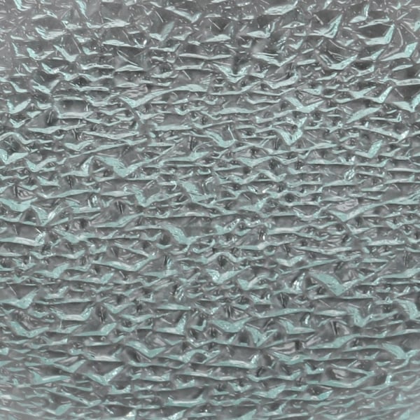 Nahaufnahme von dem Glas Kerzenteller rund mit Struktur, 11,7 cm.