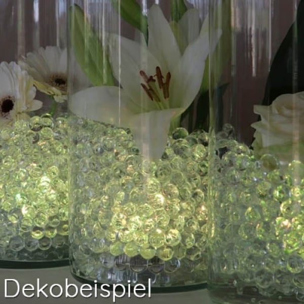 Dekobeispiel 4 LED Unterwasser Lichter mit Farbwechsel inkl. Fernbedienungen.