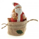 Gastgeschenk Glitzer Weihnachtsmann mit Sack auf Schulter im Jutebeutel, 65 mm