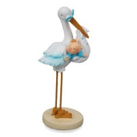Baby Jungen vom Storch getragen. gallery